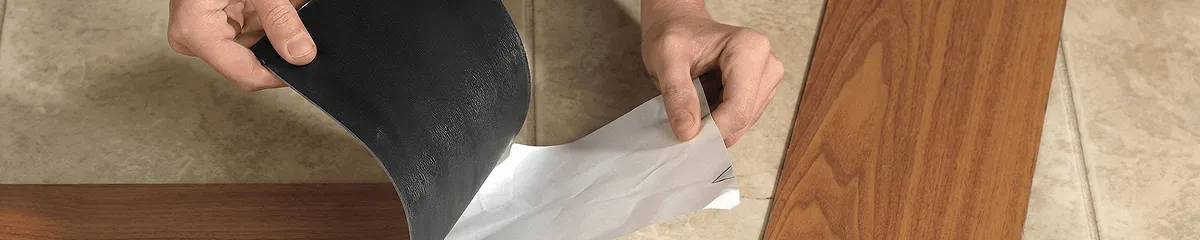 A professional installing vinyl flooring in Cape Coral, FL